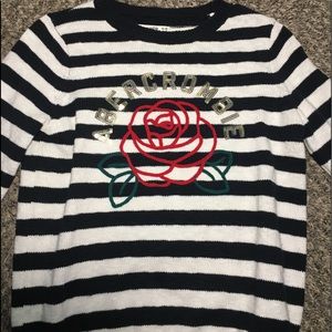 A black & white striped sweater.